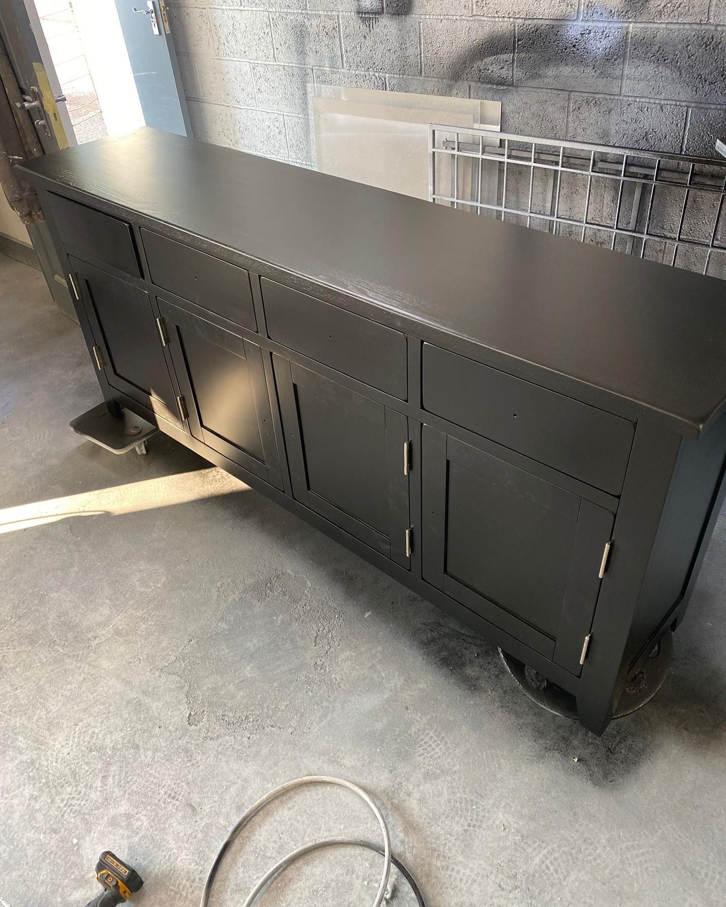 Kitchen unit sprayed in a deep green finish