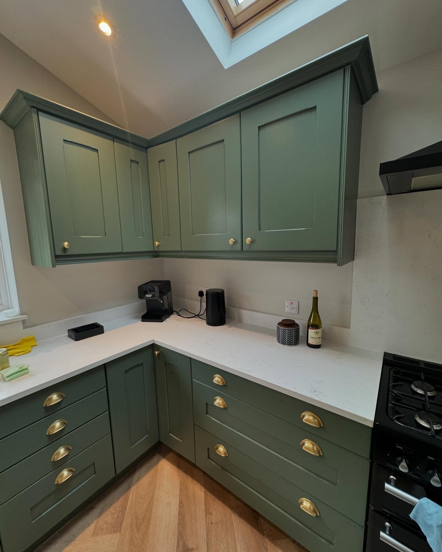 Shaker kitchen sprayed in sage green
